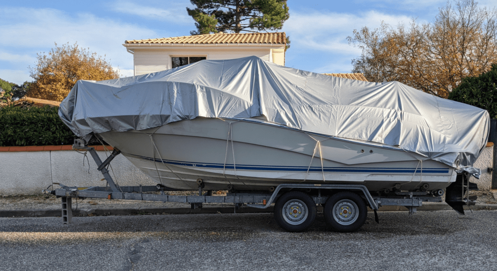 Covered Boat parked at home
