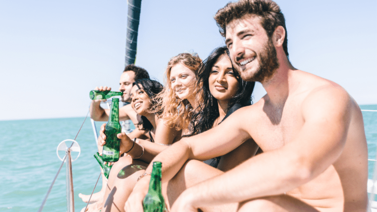 passengers on the boat drinking alcohol